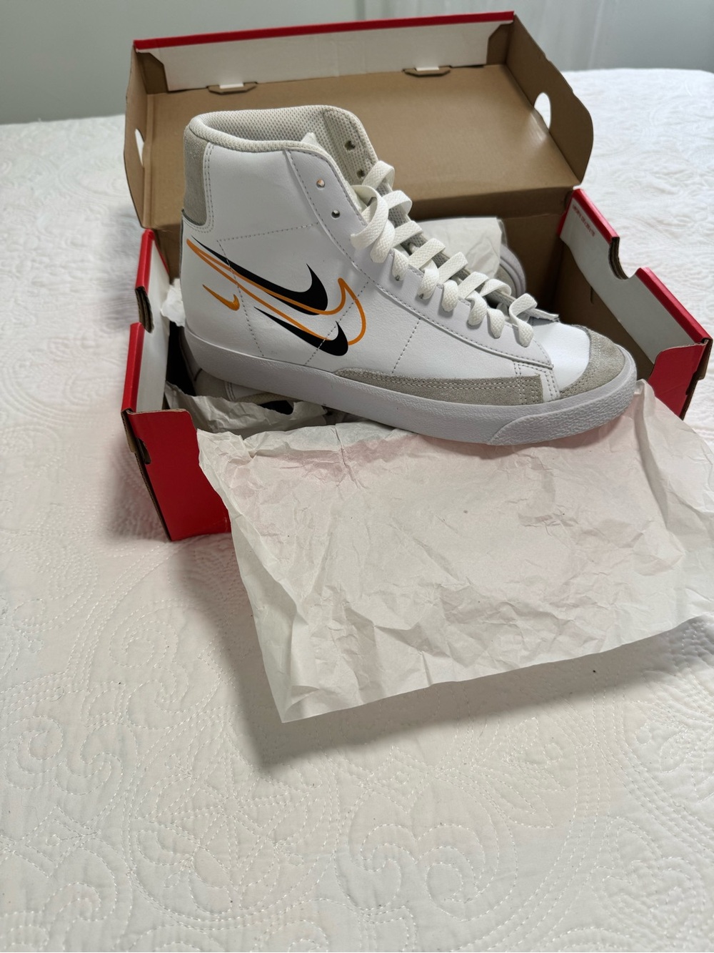 Nike White High-Top Sneakers with Black & Gold Swooshes